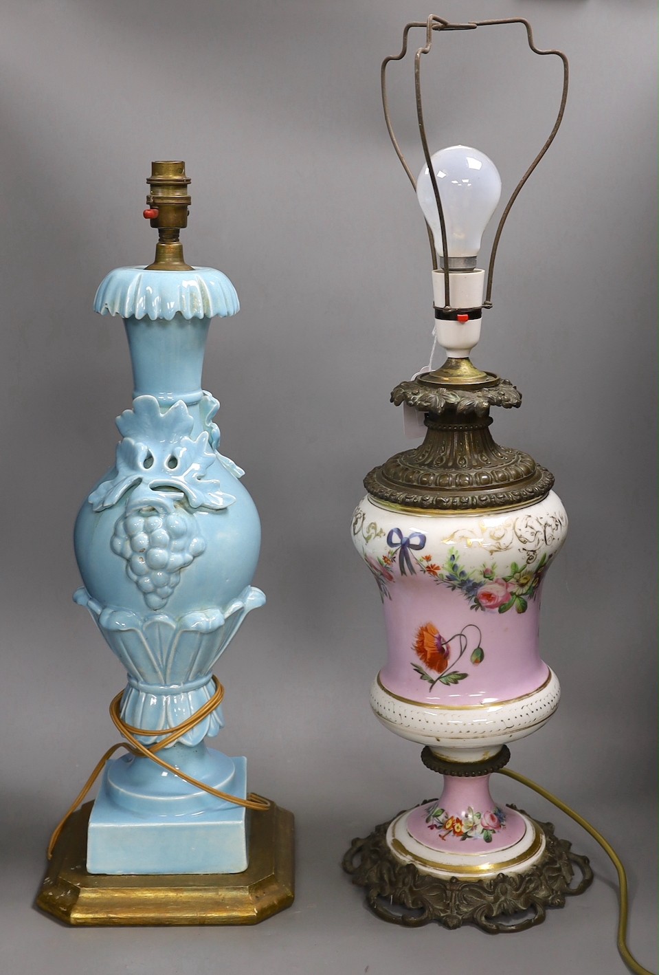 A Victorian brass mounted bone china table lamp and another